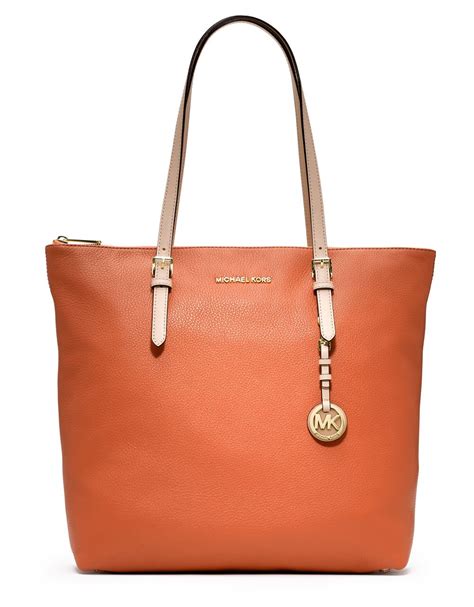 michael kors tangerine large jet set bag|Michael Kors shoulder bag.